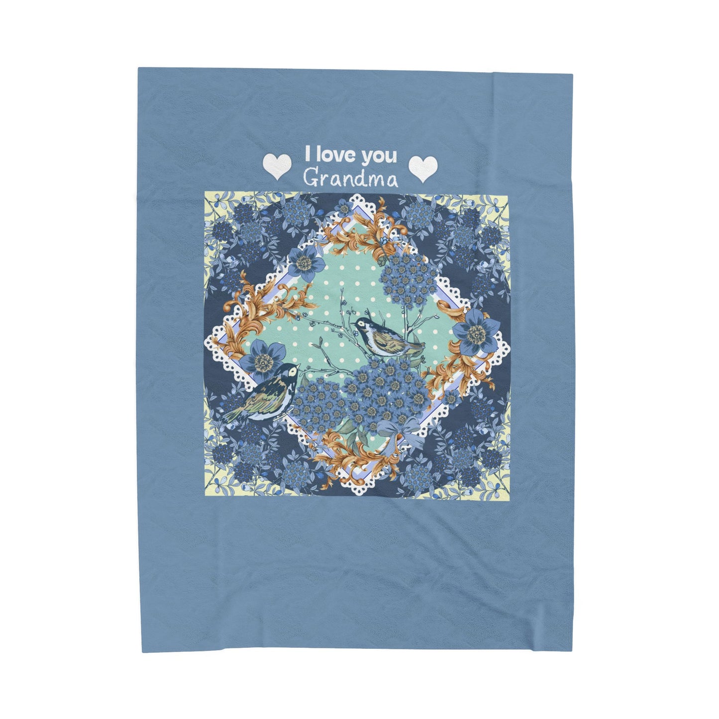 Blue blanket with floral design and 'I love you Grandma' text on a white background