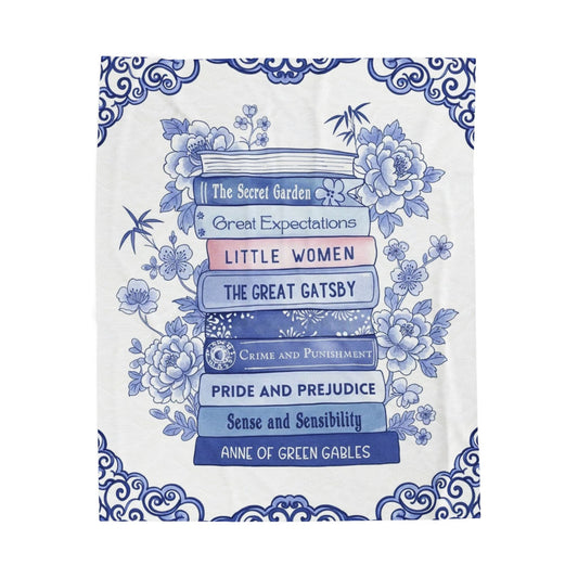 Blue chinoiserie blanket draped on couch, perfect for reading nook