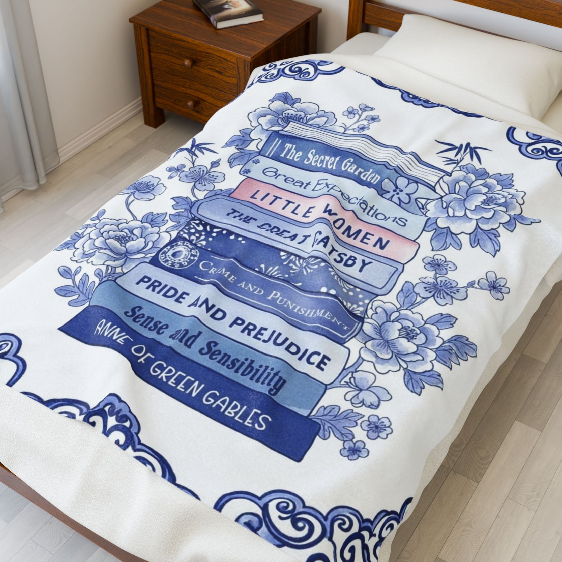 Close-up of plush velvet blanket texture with literary book stack pattern