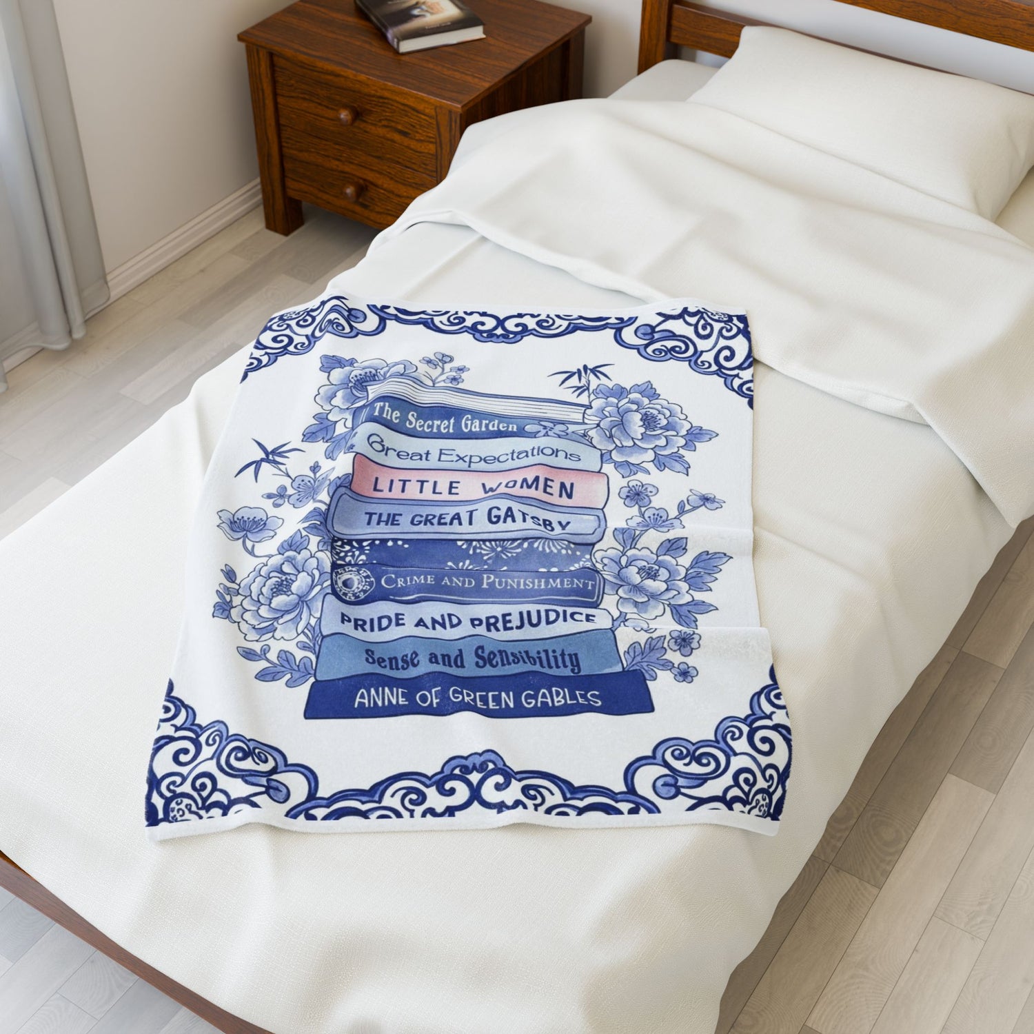 Book lover velvet blanket with stacked classic novels and chinoiserie floral design
